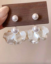 Komplektas (auskarai + karoliai)