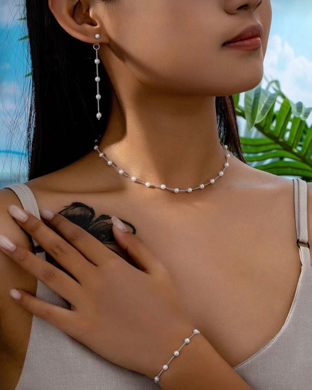 Komplektas (auskarai + karoliai)