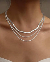 Komplektas (auskarai + karoliai)